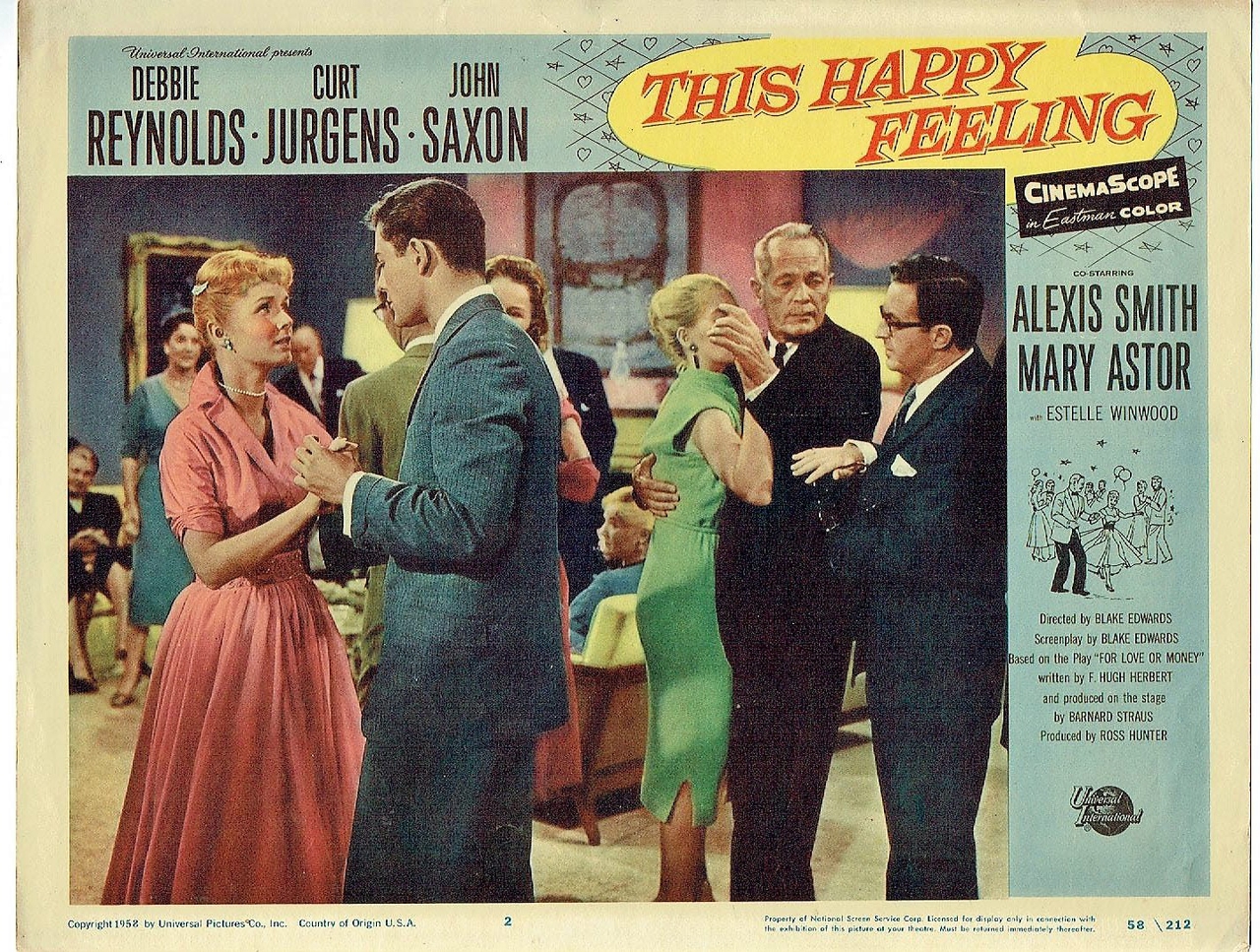 Curd Jürgens در صحنه فیلم سینمایی This Happy Feeling به همراه جان ساکسون، Debbie Reynolds و Joe Flynn