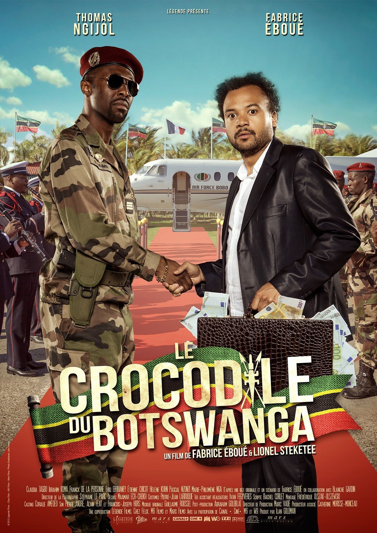 Thomas N'Gijol در صحنه فیلم سینمایی Le crocodile du Botswanga به همراه Fabrice Eboué