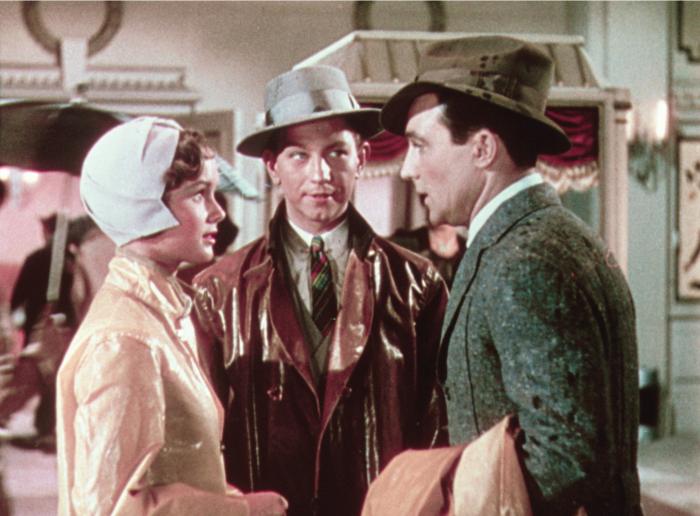 Donald O'Connor در صحنه فیلم سینمایی آواز در باران به همراه جین کلی و Debbie Reynolds