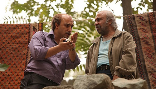 محسن تنابنده در صحنه فیلم سینمایی آینه شمعدون به همراه رضا عطاران