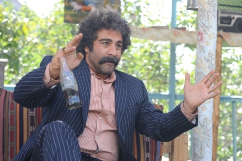 محسن تنابنده در صحنه فیلم سینمایی ایران برگر