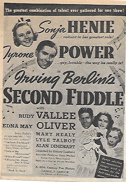 Tyrone Power در صحنه فیلم سینمایی Second Fiddle به همراه Sonja Henie، Rudy Vallee، Lyle Talbot، Edna May Oliver و Mary Healy