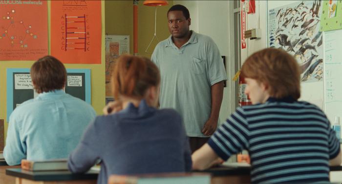 Quinton Aaron در صحنه فیلم سینمایی نقطهٔ کور