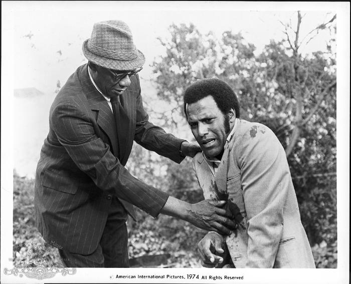 Fred Williamson در صحنه فیلم سینمایی Hell Up in Harlem به همراه Julius Harris