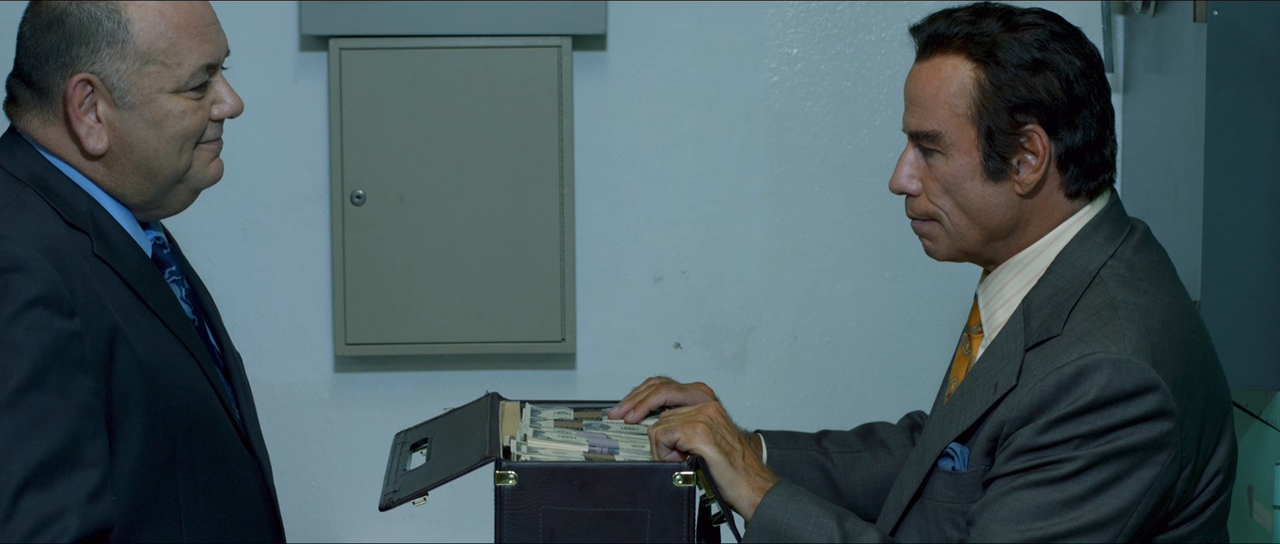 جان تراولتا در صحنه فیلم سینمایی Speed Kills