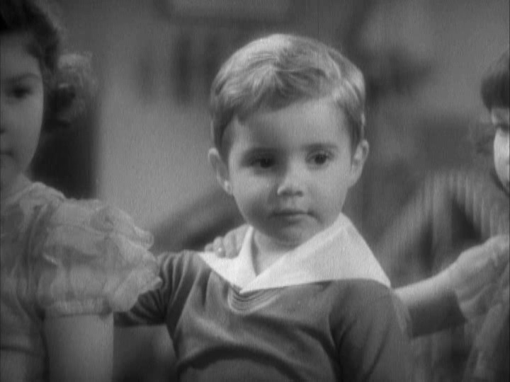 Scotty Beckett در صحنه فیلم سینمایی Stand Up and Cheer!