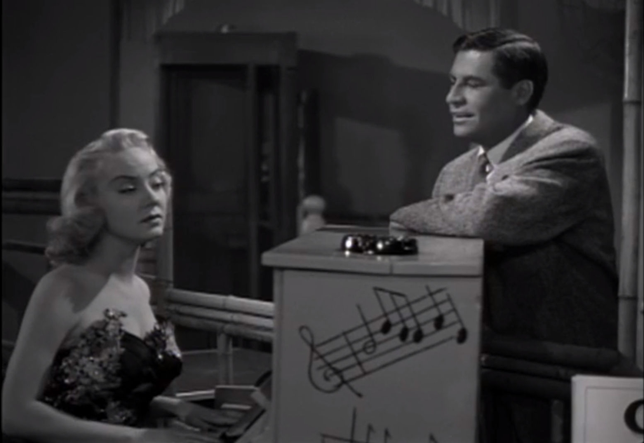 John Hodiak در صحنه فیلم سینمایی The Sellout به همراه Audrey Totter