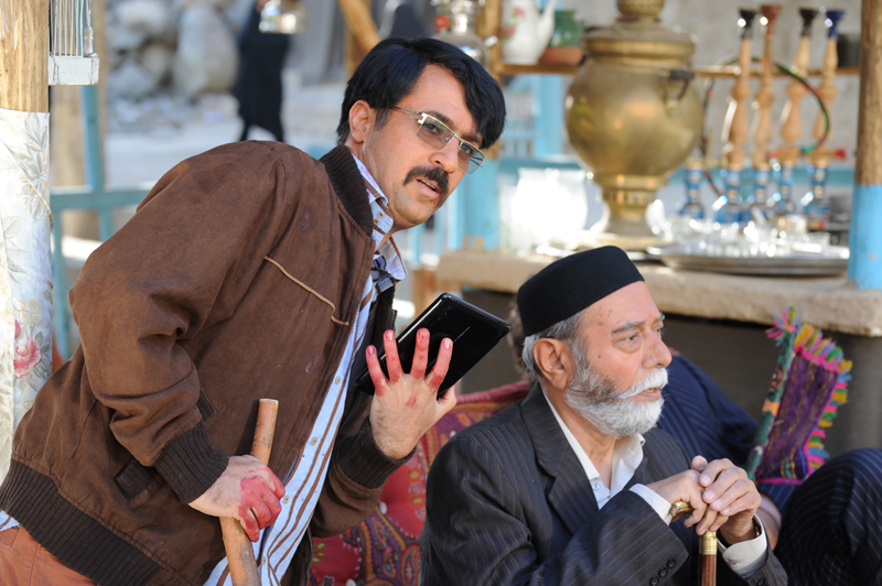 علی نصیریان در صحنه فیلم سینمایی ایران برگر به همراه احمد مهران‌فر