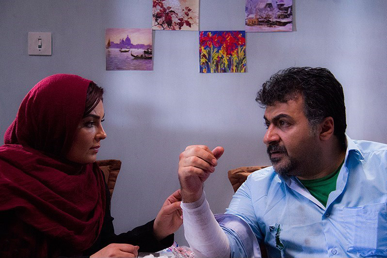شهرام عبدلی در صحنه فیلم سینمایی ماه گرفتگی به همراه سارا خوئینی‌ها