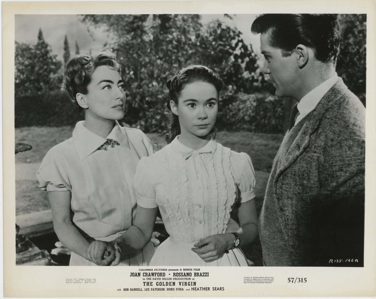 Heather Sears در صحنه فیلم سینمایی The Story of Esther Costello به همراه Lee Patterson و Joan Crawford