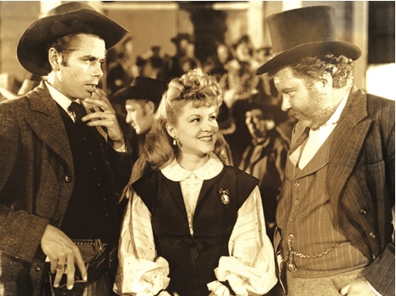Claire Trevor در صحنه فیلم سینمایی Texas به همراه Glenn Ford و Edgar Buchanan