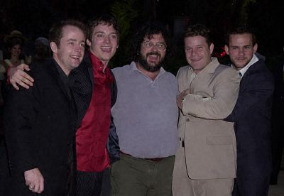 بیلی بوید در صحنه فیلم سینمایی ارباب حلقه ها: یاران حلقه به همراه شان آستین، Dominic Monaghan، پیتر جکسون و الیجاه وود