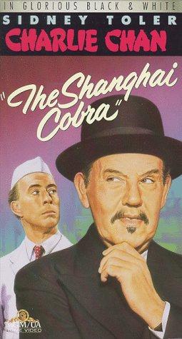 George Chandler در صحنه فیلم سینمایی The Shanghai Cobra به همراه Sidney Toler