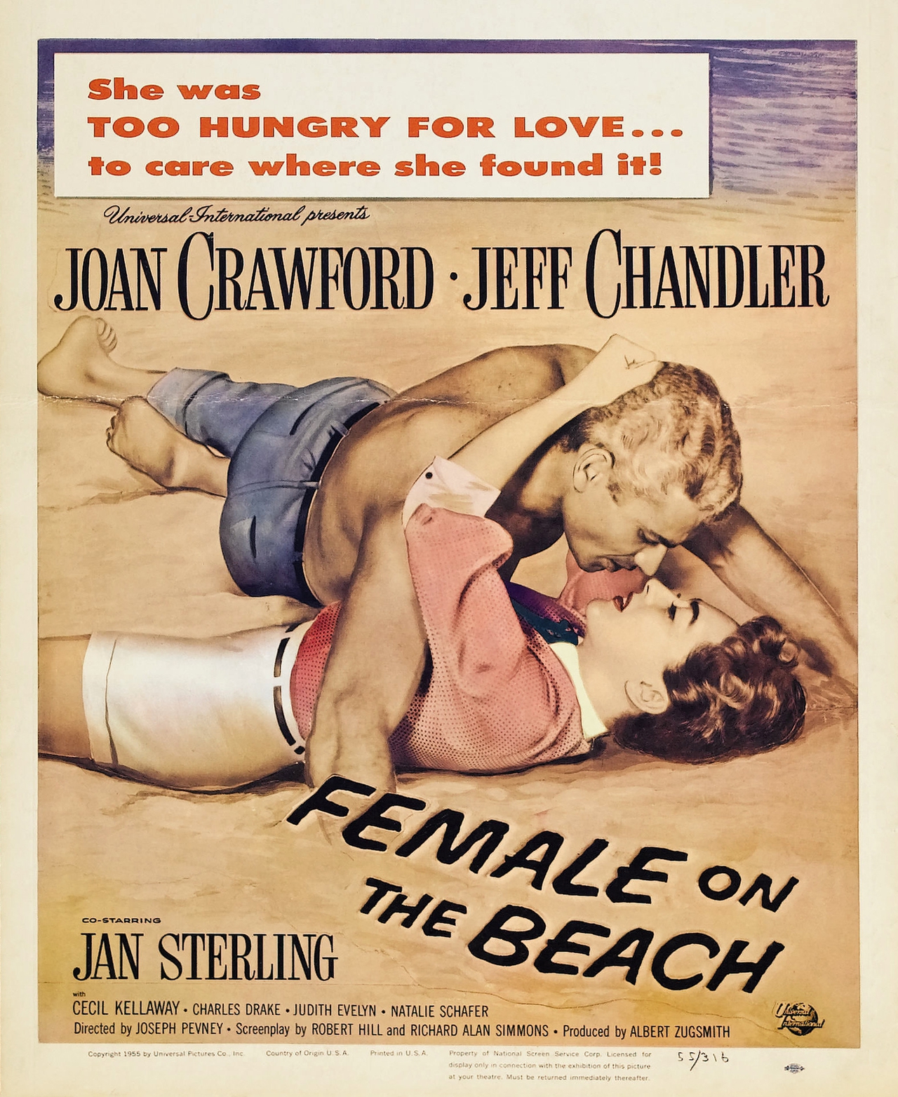 Jeff Chandler در صحنه فیلم سینمایی Female on the Beach به همراه Joan Crawford