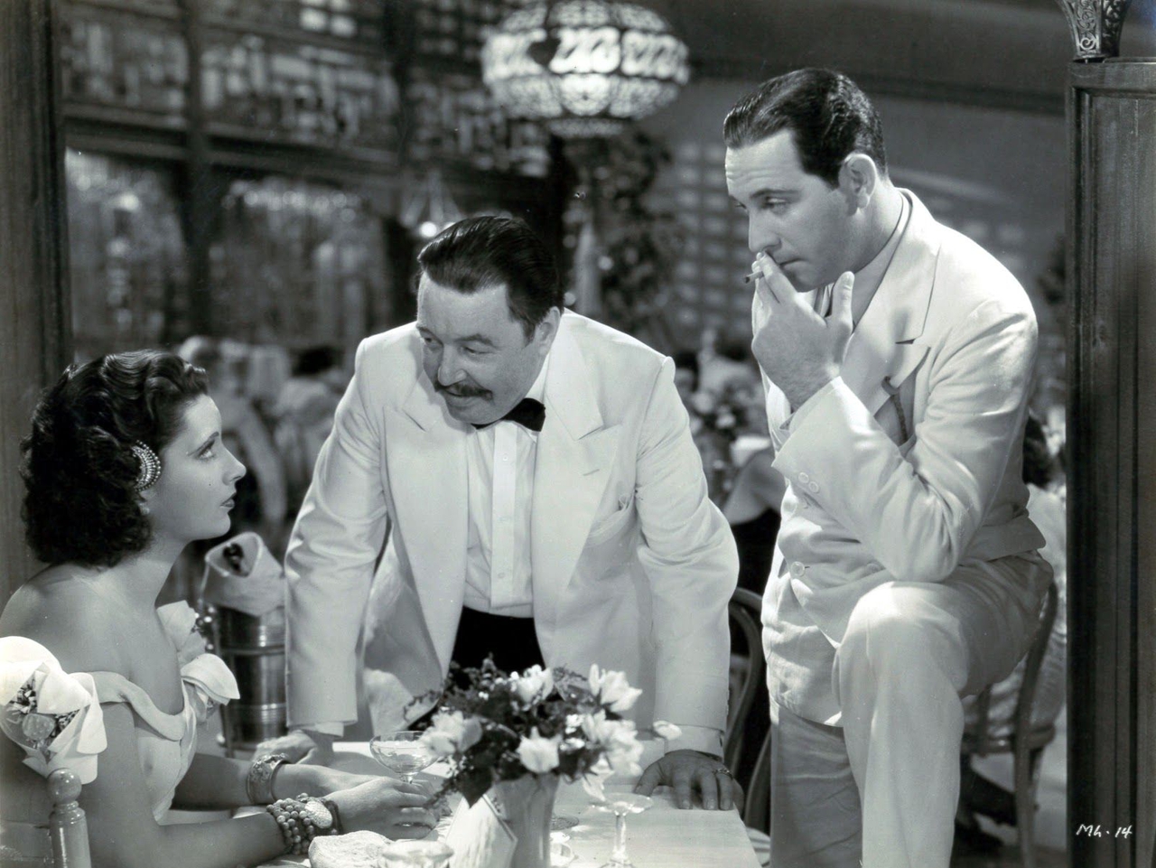 وارنر اولاند در صحنه فیلم سینمایی Mandalay به همراه Ricardo Cortez و Kay Francis