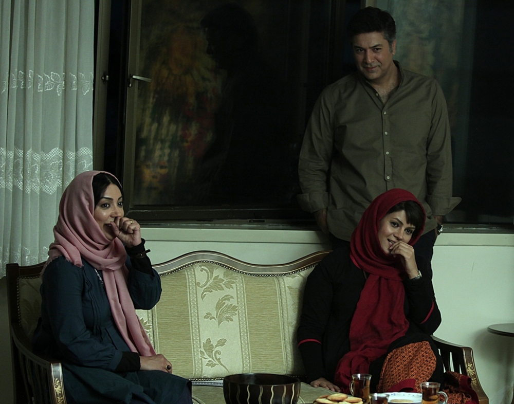 حمیدرضا پگاه در صحنه فیلم سینمایی رقص پا به همراه نگار عابدی