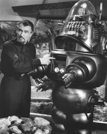 والتر پیجن در صحنه فیلم سینمایی سیاره ممنوعه به همراه Robby the Robot