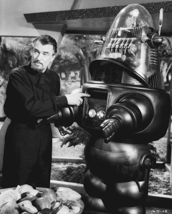 والتر پیجن در صحنه فیلم سینمایی سیاره ممنوعه به همراه Robby the Robot