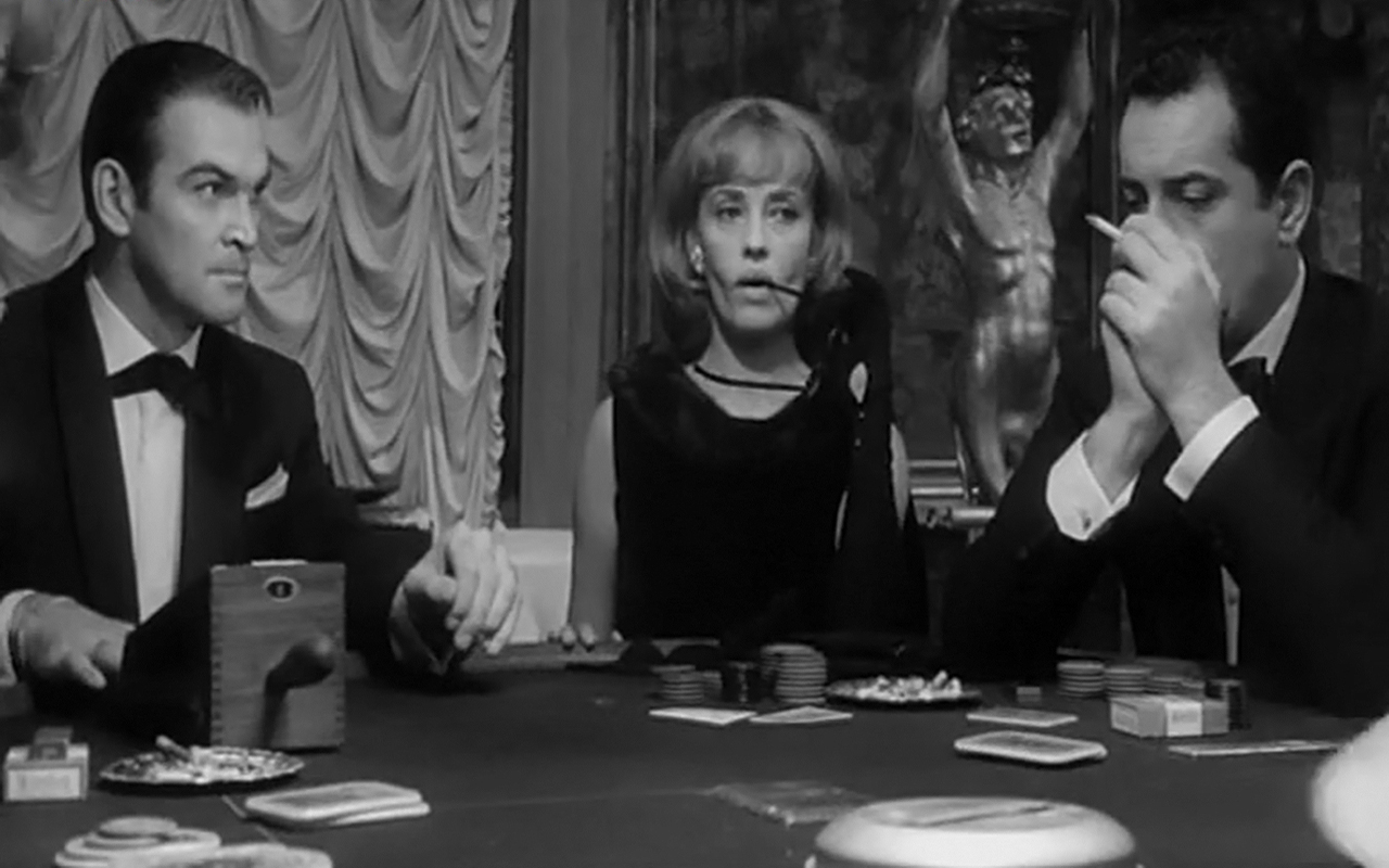 Jeanne Moreau در صحنه فیلم سینمایی Eva به همراه Riccardo Garrone و Stanley Baker