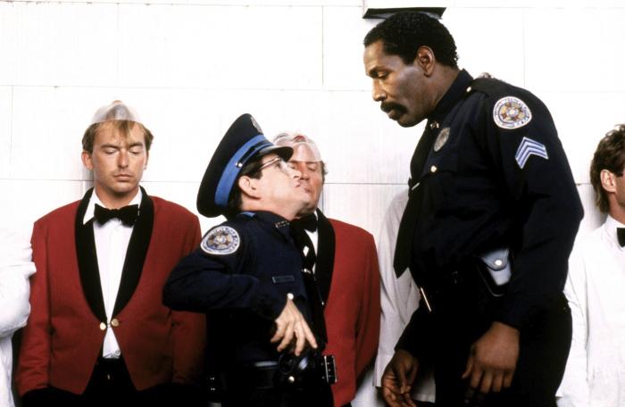 Tim Kazurinsky در صحنه فیلم سینمایی Police Academy 3: Back in Training به همراه Bubba Smith