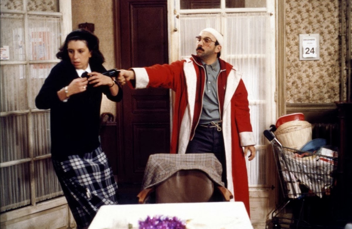 Gérard Jugnot در صحنه فیلم سینمایی Le père Noël est une ordure به همراه Anémone