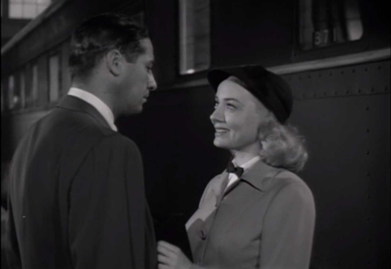 John Hodiak در صحنه فیلم سینمایی The Sellout به همراه Audrey Totter