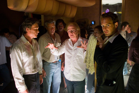 ولفگانگ پترسن در صحنه فیلم سینمایی پوزیدون به همراه کرت راسل و Josh Lucas