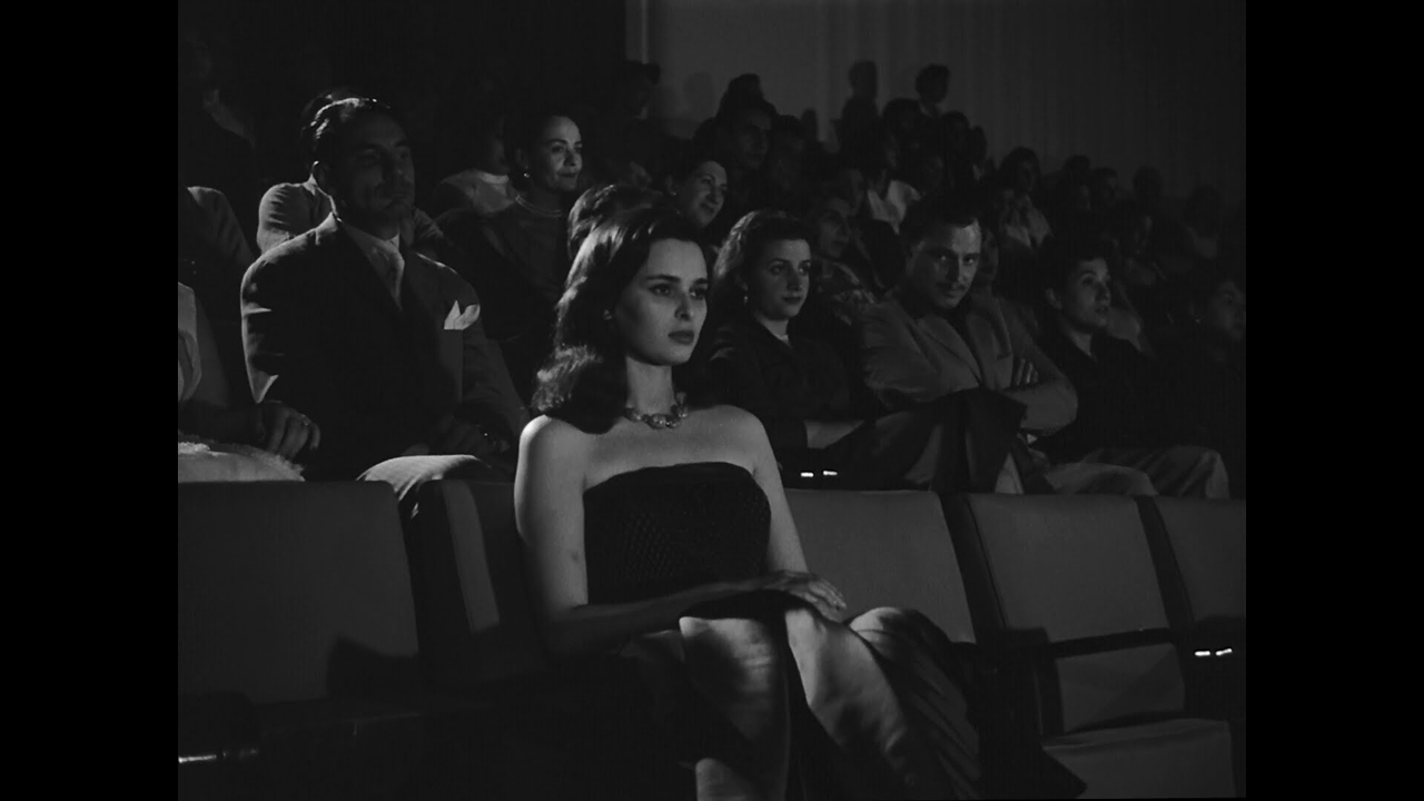 Lucia Bosé در صحنه فیلم سینمایی The Lady Without Camelias به همراه Ivan Desny