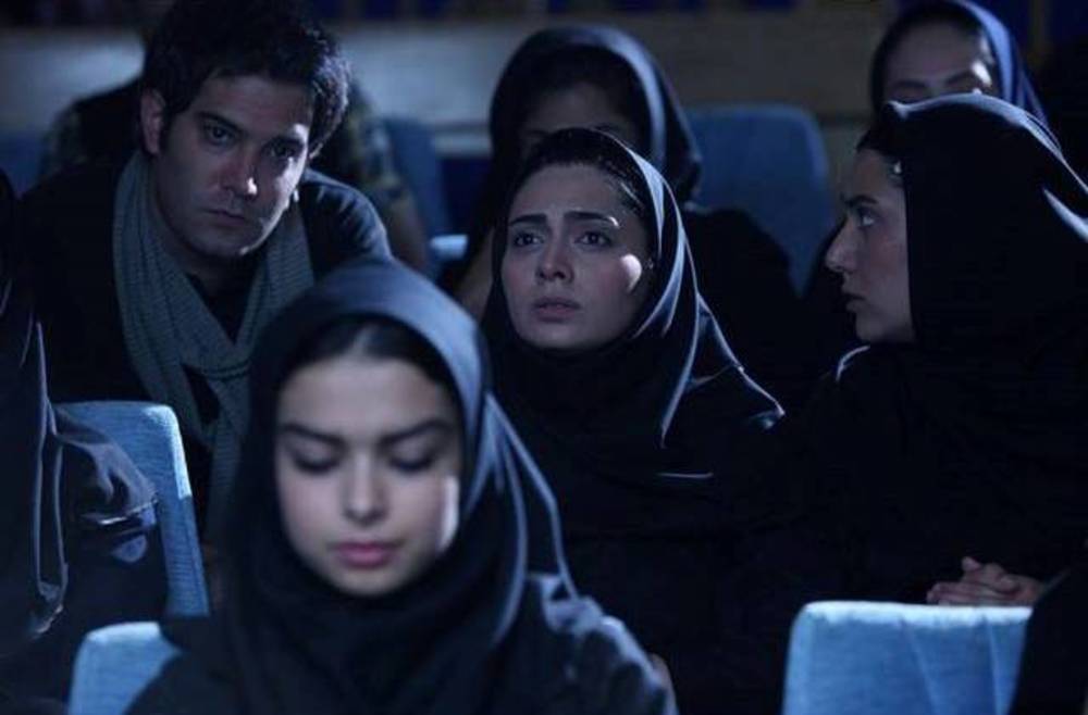 امیرعلی نبویان در صحنه فیلم سینمایی خانه دختر به همراه پگاه آهنگرانی