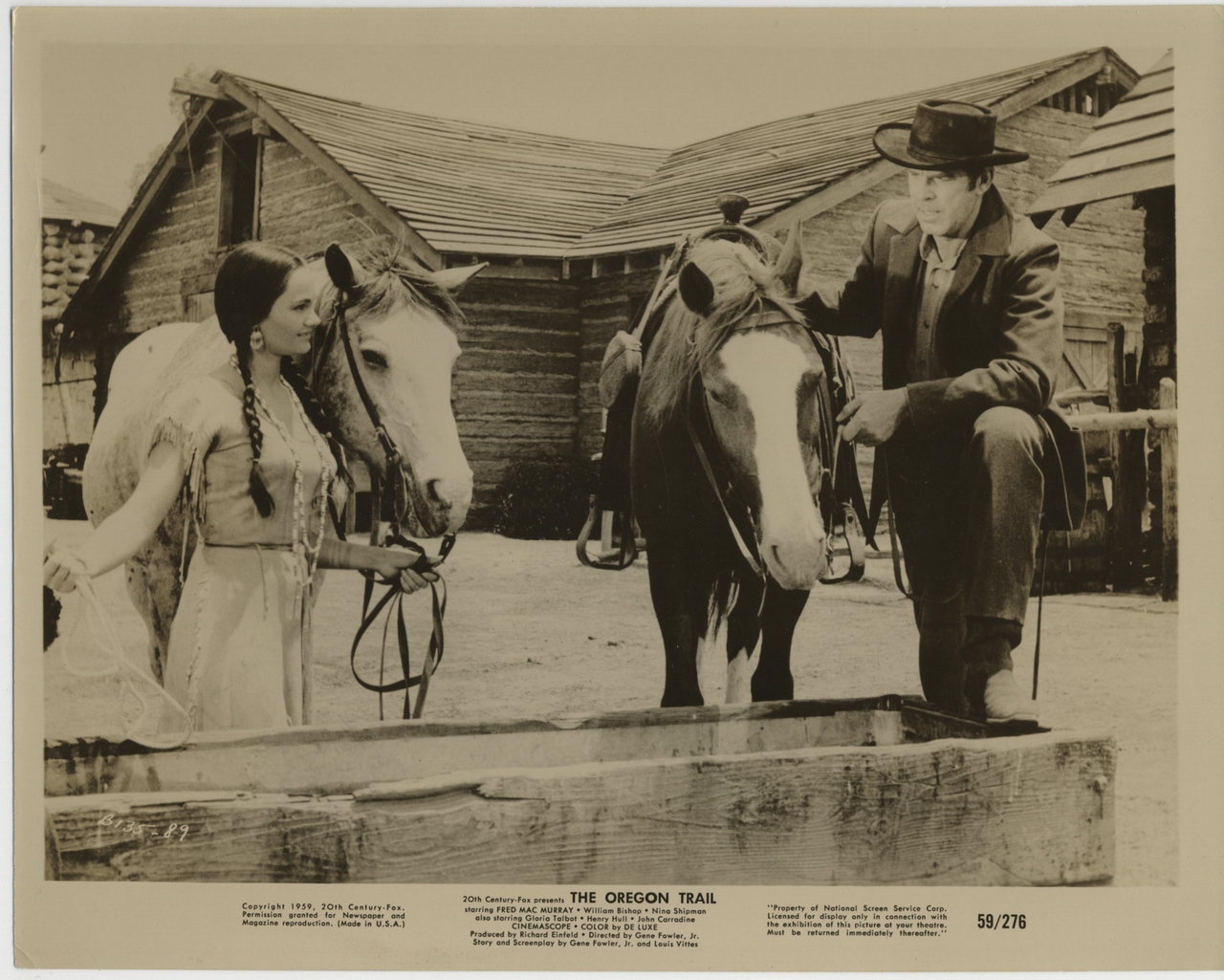 Gloria Talbott در صحنه فیلم سینمایی The Oregon Trail به همراه فرد مک  موری