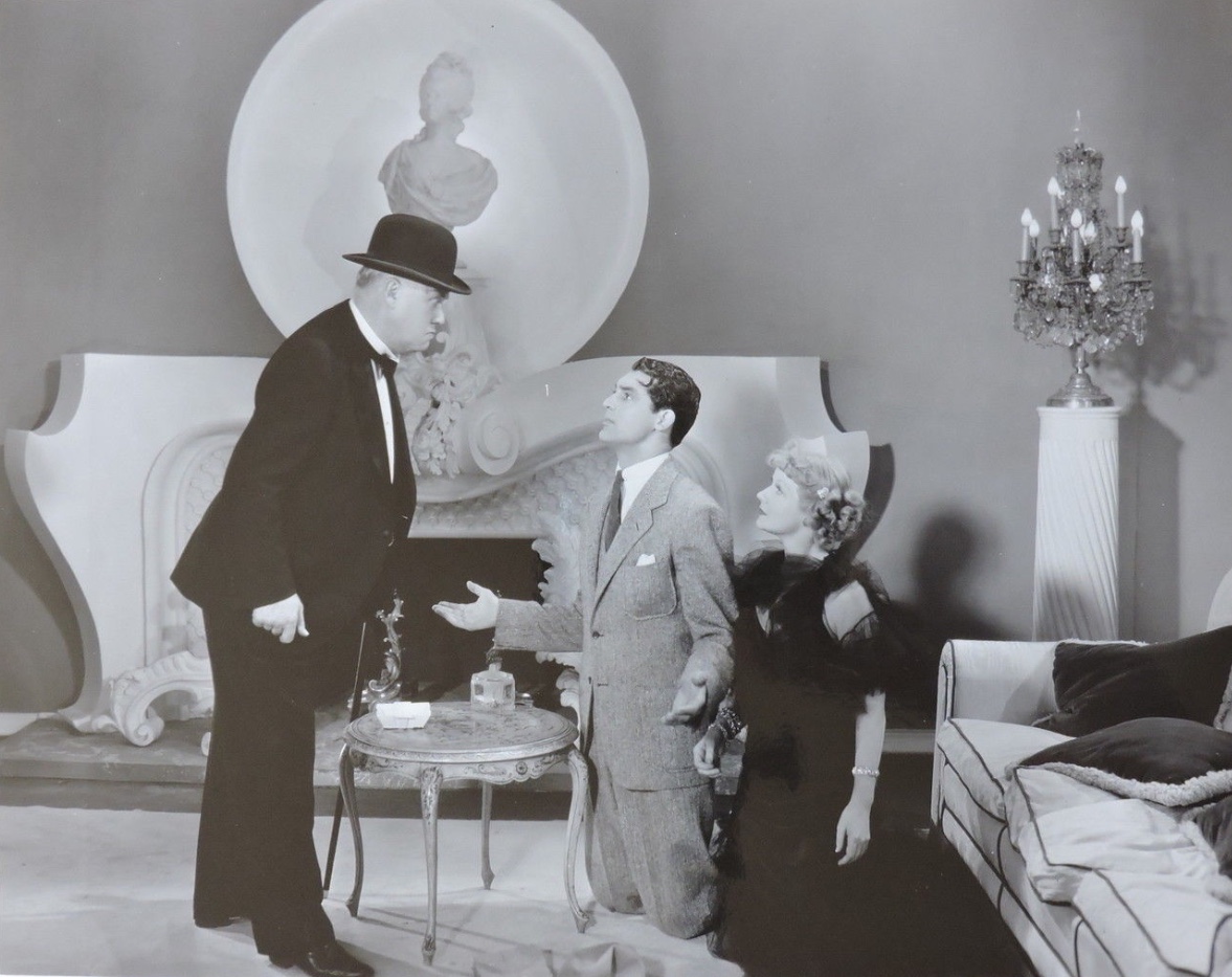 George Barbier در صحنه فیلم سینمایی Ladies Should Listen به همراه Nydia Westman و کری گرانت