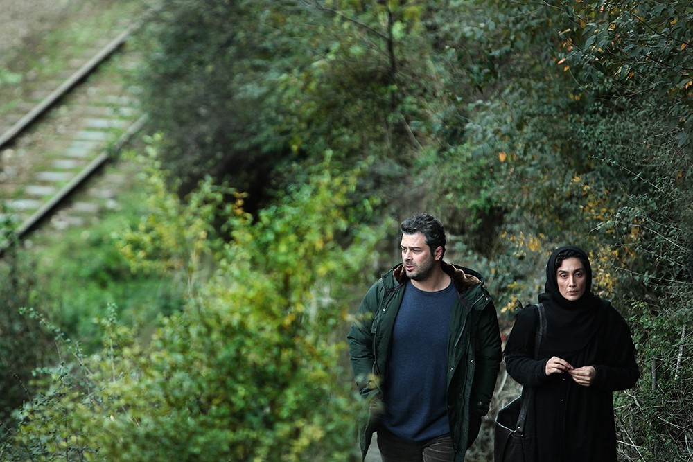 پژمان بازغی در صحنه فیلم سینمایی اسرافیل به همراه هدیه تهرانی