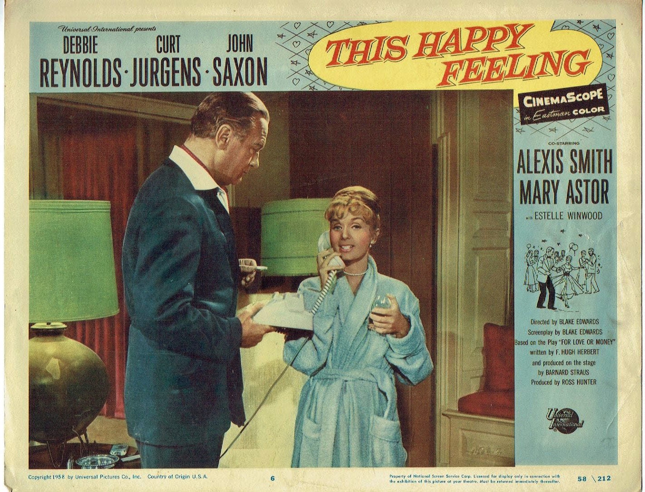 Curd Jürgens در صحنه فیلم سینمایی This Happy Feeling به همراه Debbie Reynolds