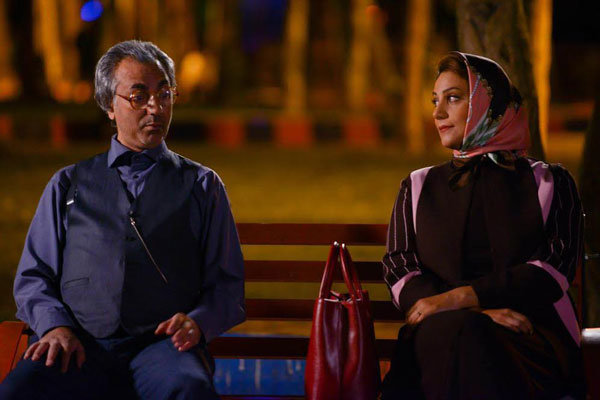 محمدرضا هدایتی در صحنه فیلم سینمایی شکلاتی به همراه شبنم مقدمی