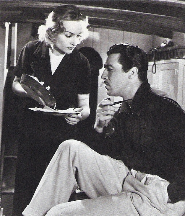Cesar Romero در صحنه فیلم سینمایی Love Before Breakfast به همراه Carole Lombard