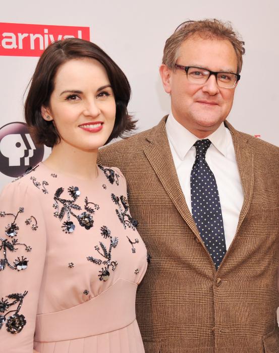 Michelle Dockery در صحنه سریال تلویزیونی دانتون ابی به همراه Hugh Bonneville