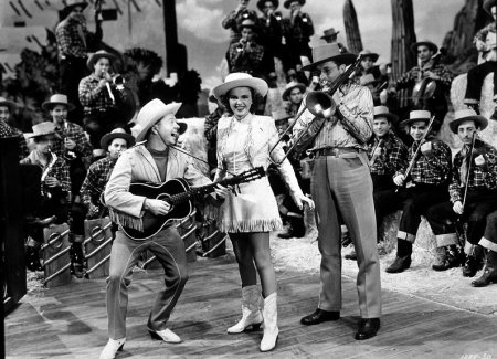 Tommy Dorsey در صحنه فیلم سینمایی Girl Crazy به همراه جودی گارلند و Mickey Rooney
