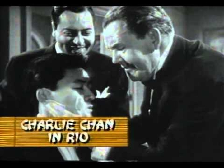 Victor Sen Yung در صحنه فیلم سینمایی Charlie Chan in Rio به همراه Sidney Toler و Harold Huber