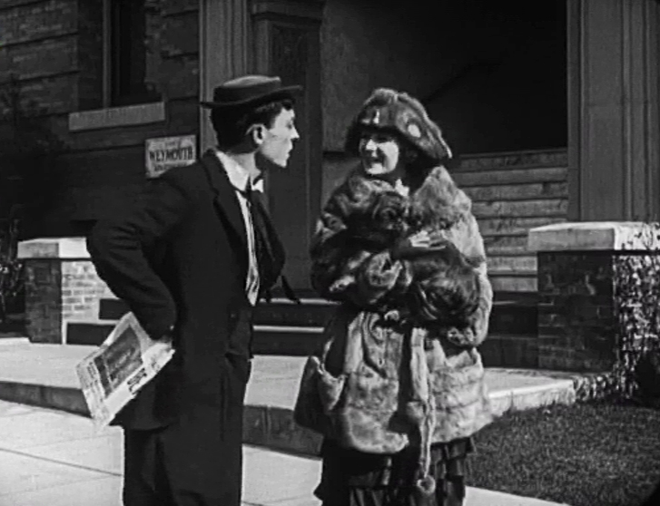 باستر کیتون در صحنه فیلم سینمایی The Goat به همراه Virginia Fox