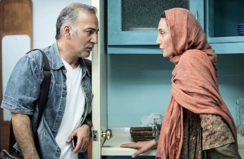 هدیه تهرانی در صحنه فیلم سینمایی عادت نمی‌کنیم به همراه حمیدرضا آذرنگ