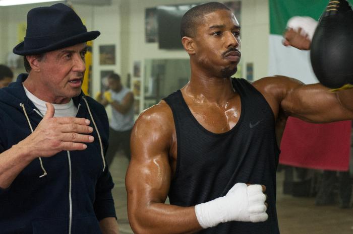 سیلوستر استالونه در صحنه فیلم سینمایی Creed به همراه Michael B. Jordan