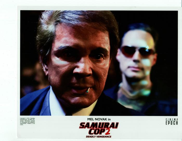 Mike Malloy در صحنه فیلم سینمایی Samurai Cop 2: Deadly Vengeance به همراه Mel Novak